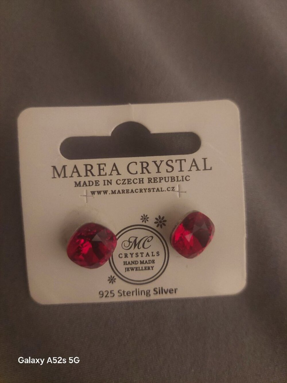 Red stud earrings